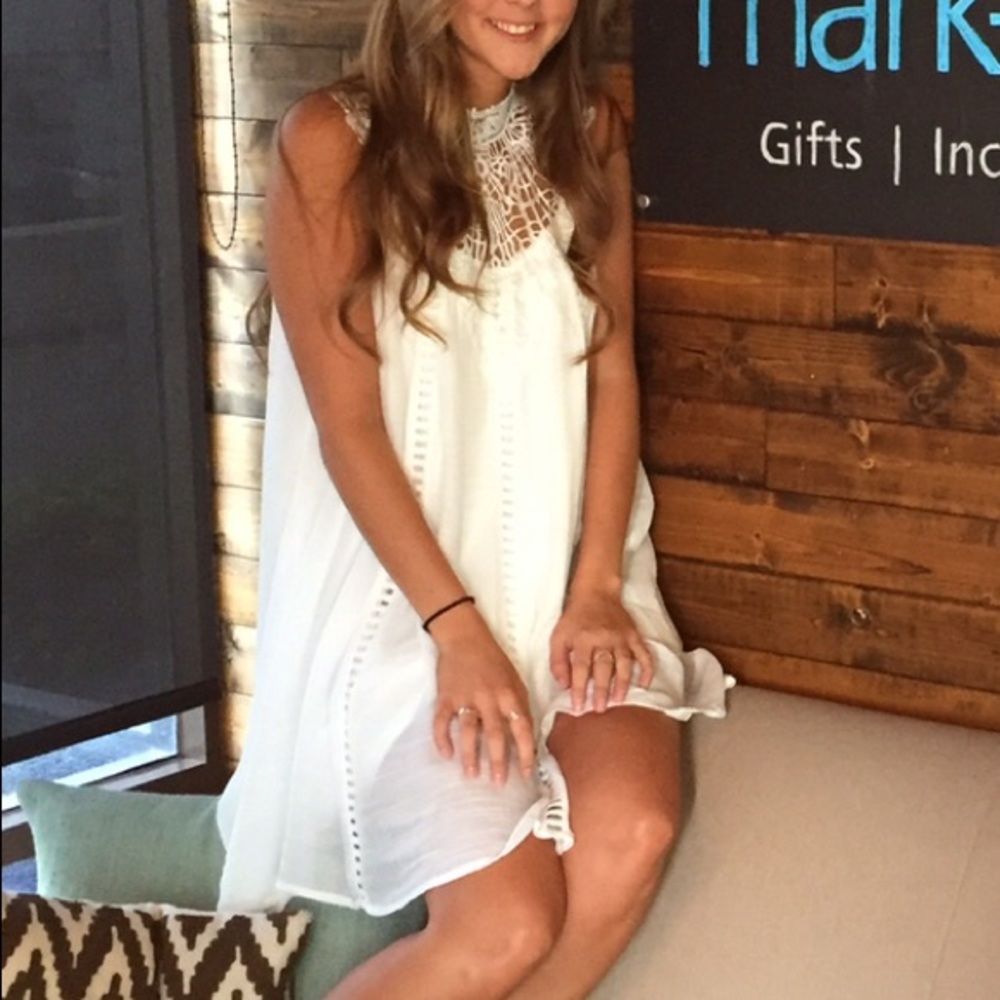 White dress with neck detail